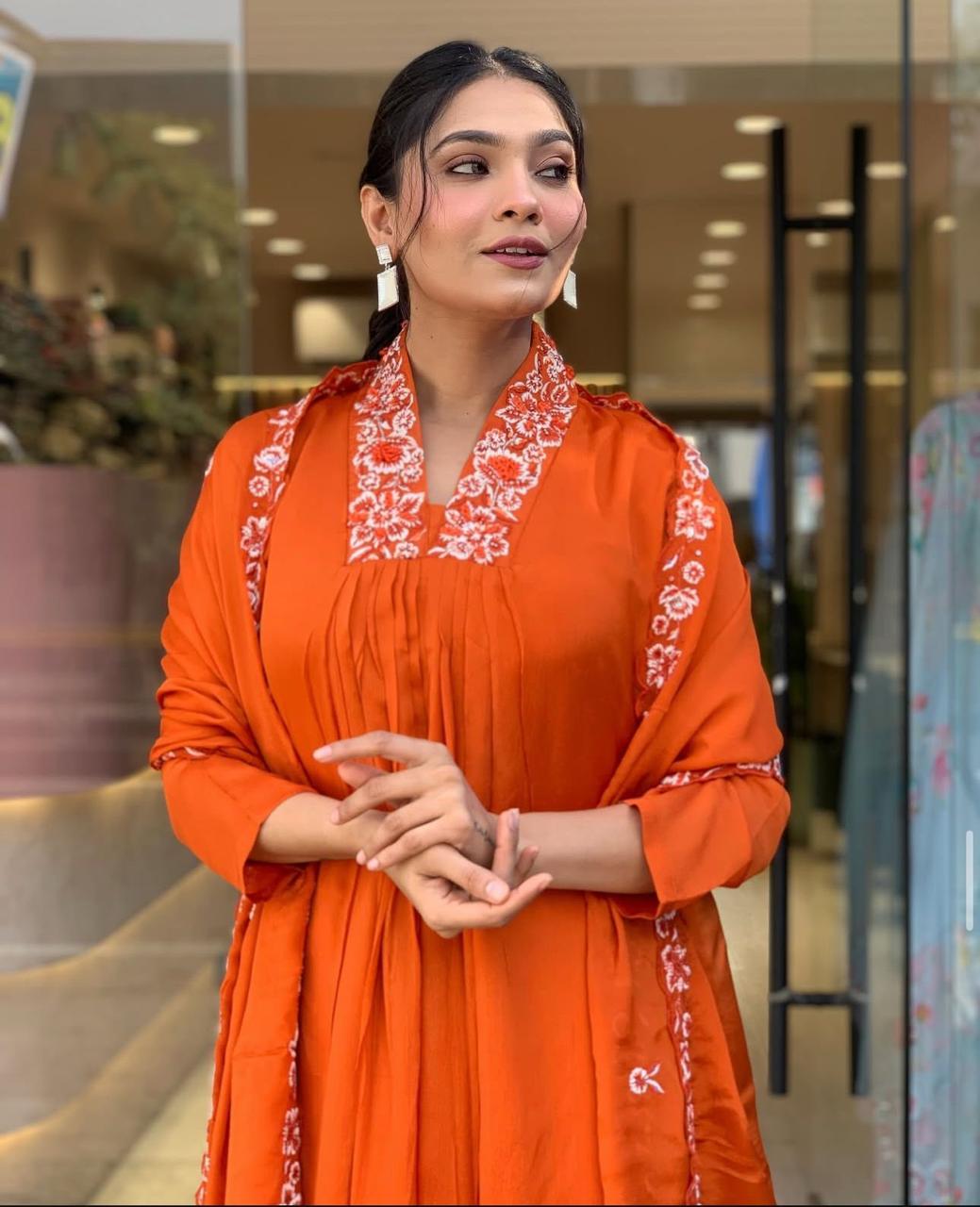 Beautiful Suit Set Decorated With Solid Orange Color Fabric And Floral Embroidery At Neck