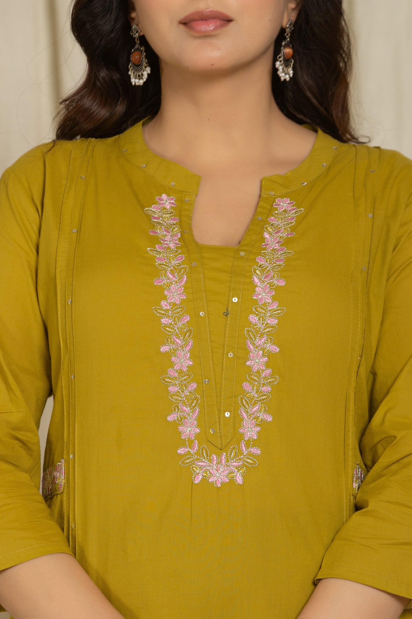 Closeup image of Olive Color Kurta Set With Silver And Pink Floral Embroidery From Samhitas Apparel