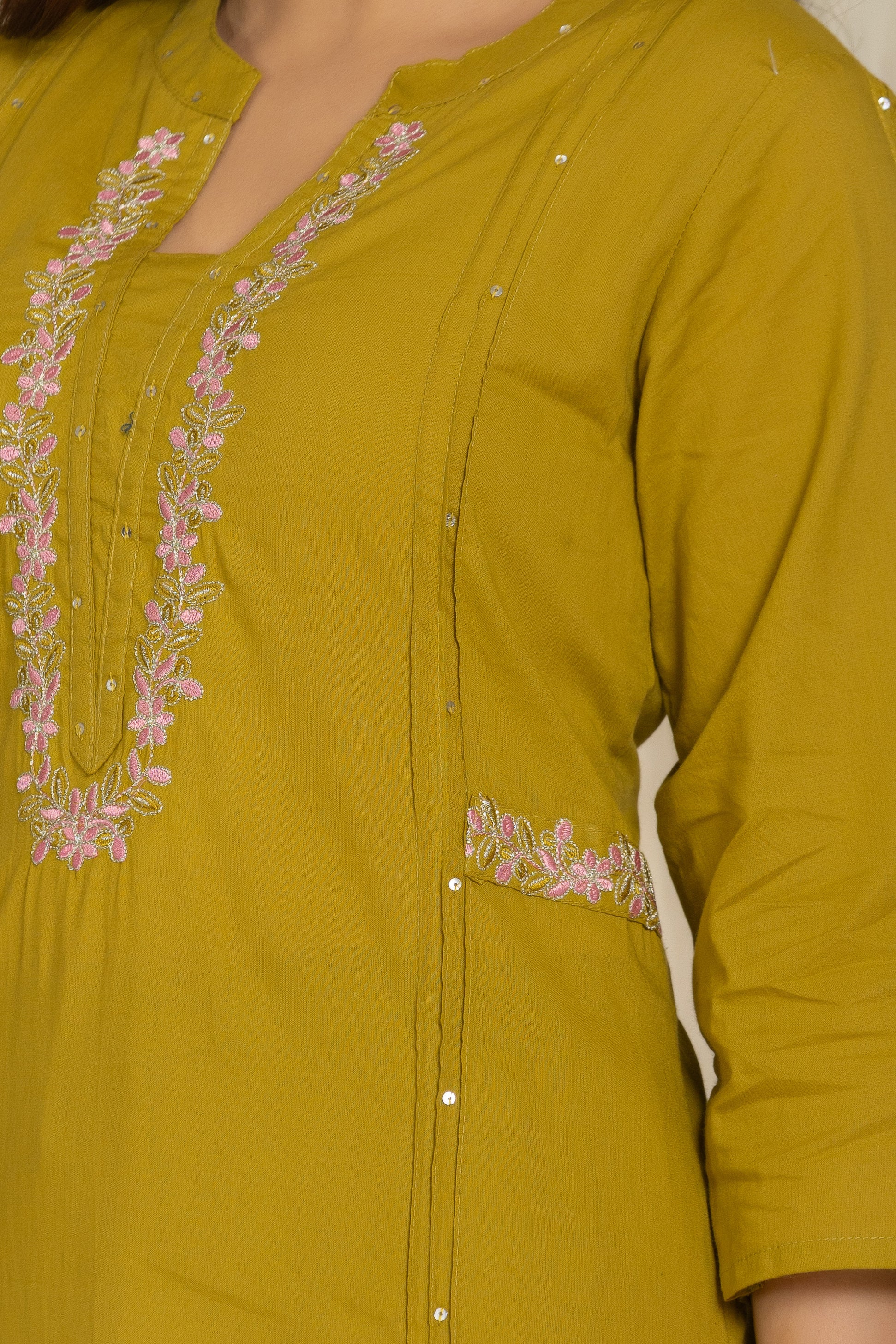 Closeup image of the embroidery work of Olive Color Kurta Set With Silver And Pink Floral Embroidery At Neck Line From Samhitas Apparel