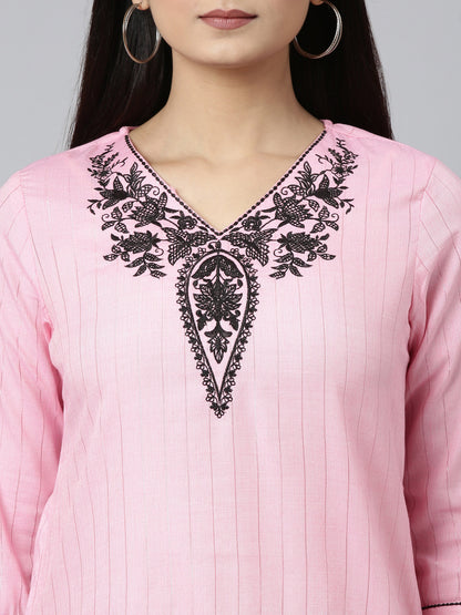 CLOSEUP VIOEW OF SAMHITAS BABY PINK SHORT KURTI WITH NECK AND SLEEVE EMBROIDERY