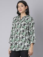 White and Green Leaf Printed Short Kurti with Mandarin Collar and Button Detailing