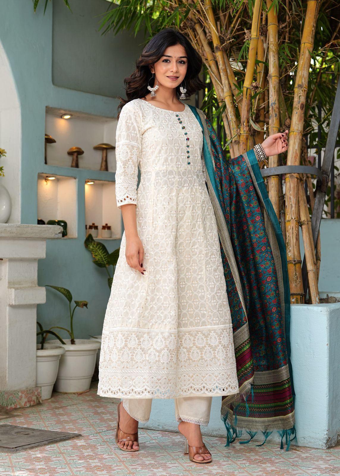 White Kurti Set, With Full  Embroidery On Kurti And A False Button Styling On Front