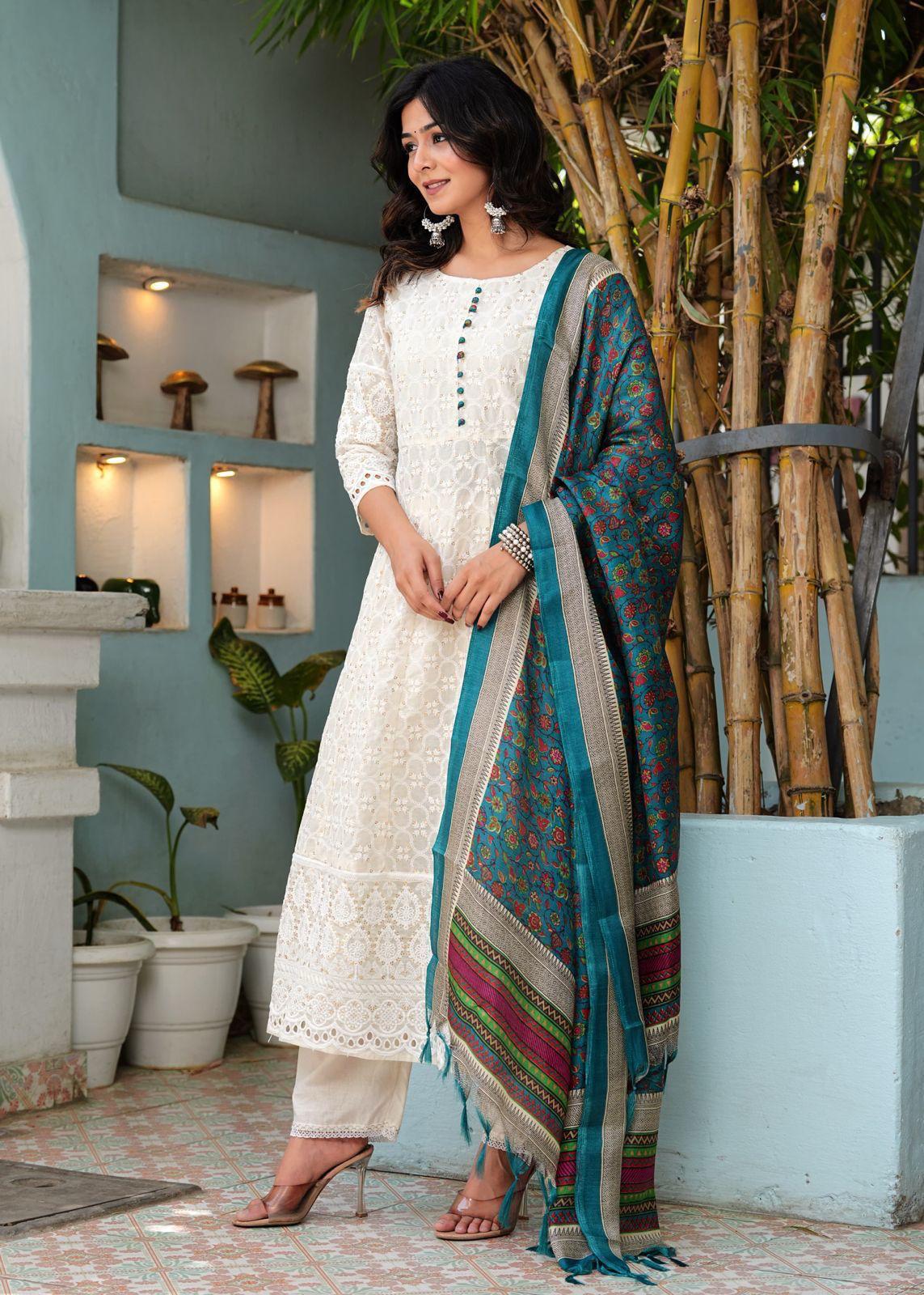 White Kurti Set, With Full  Embroidery On Kurti And A False Button Styling On Front