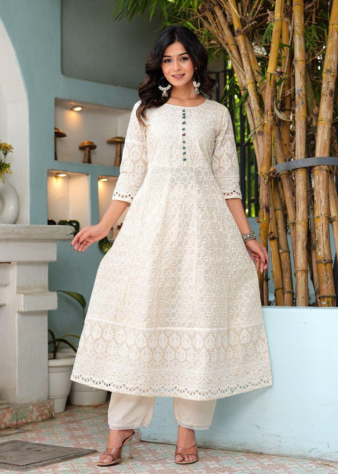 White Kurti Set, With Full  Embroidery On Kurti And A False Button Styling On Front