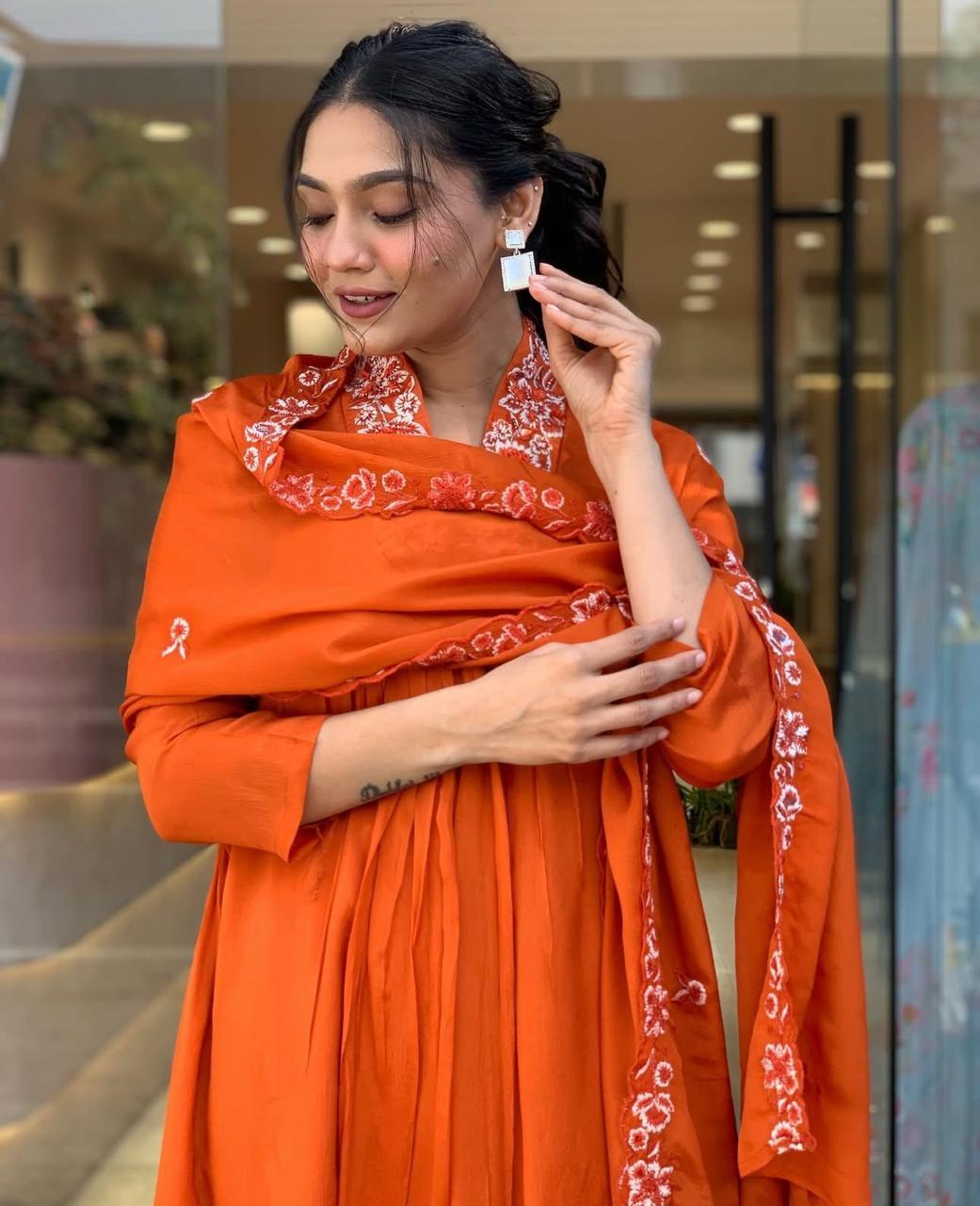 Beautiful Suit Set Decorated With Solid Orange Color Fabric And Floral Embroidery At Neck