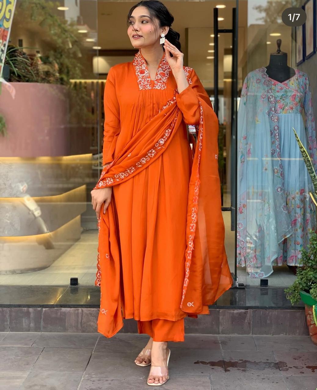 Beautiful Suit Set Decorated With Solid Orange Color Fabric And Floral Embroidery At Neck
