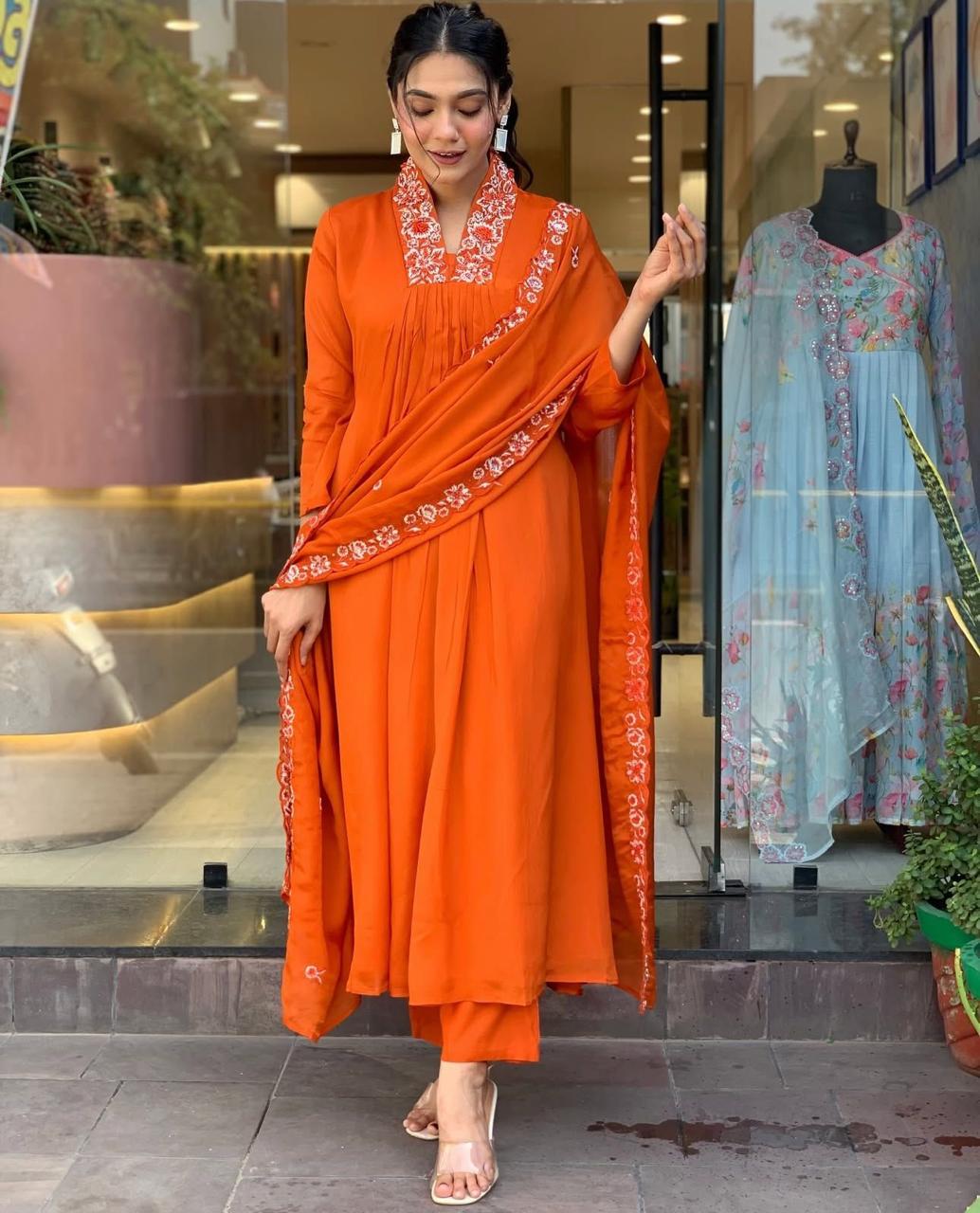Beautiful Suit Set Decorated With Solid Orange Color Fabric And Floral Embroidery At Neck