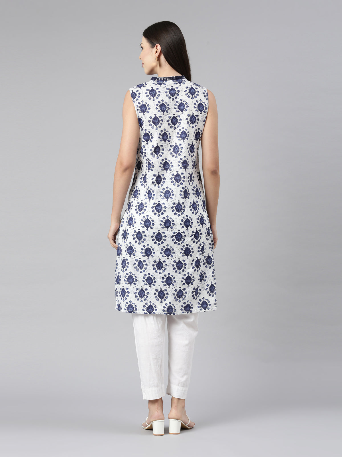 SLEEVELESS KNEE LENGTH BLUE MOTIF PRINT KURTA