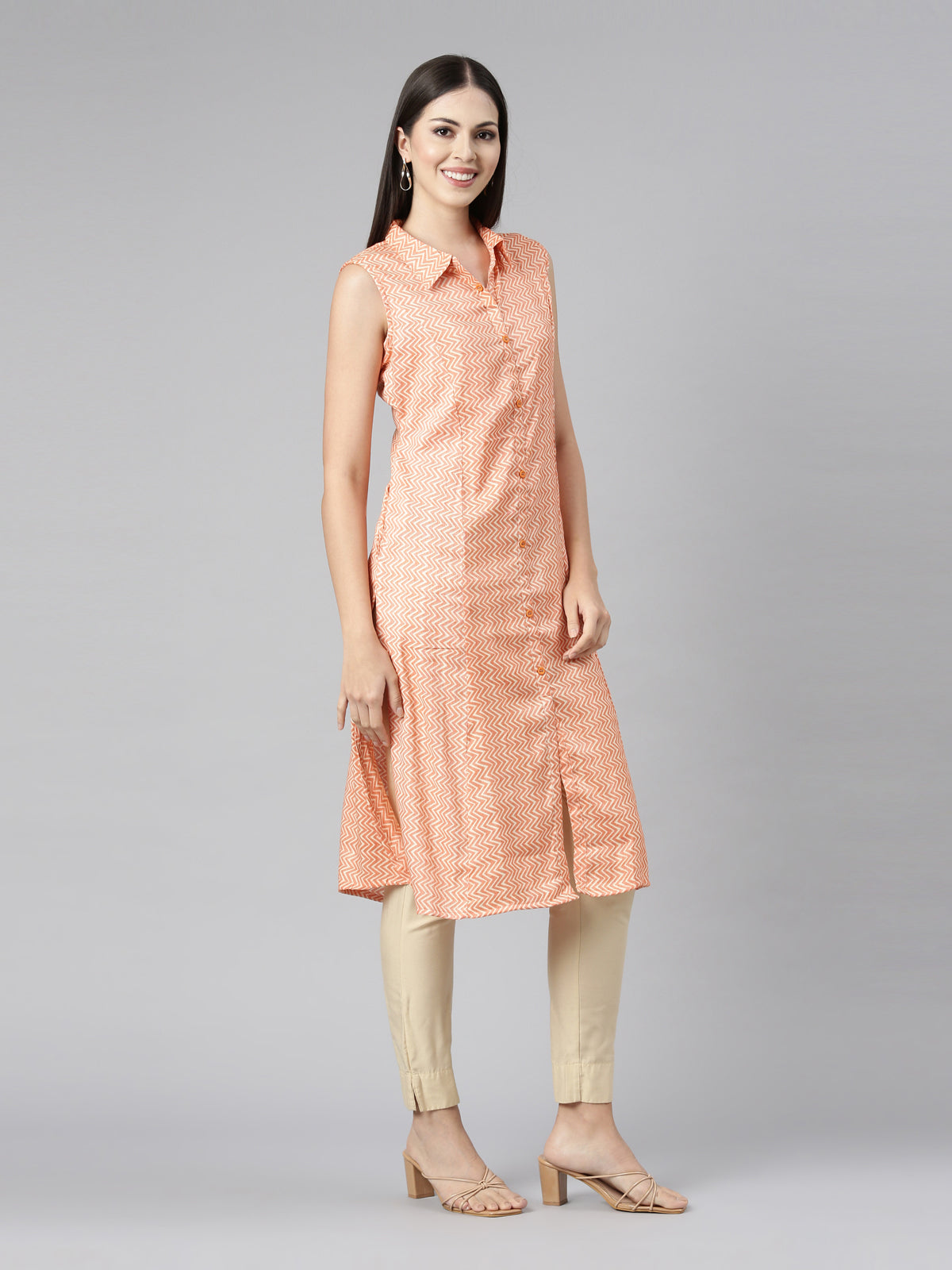 Orange Sleeveless Pastel Kurta With Long Pointed Collar And False Button